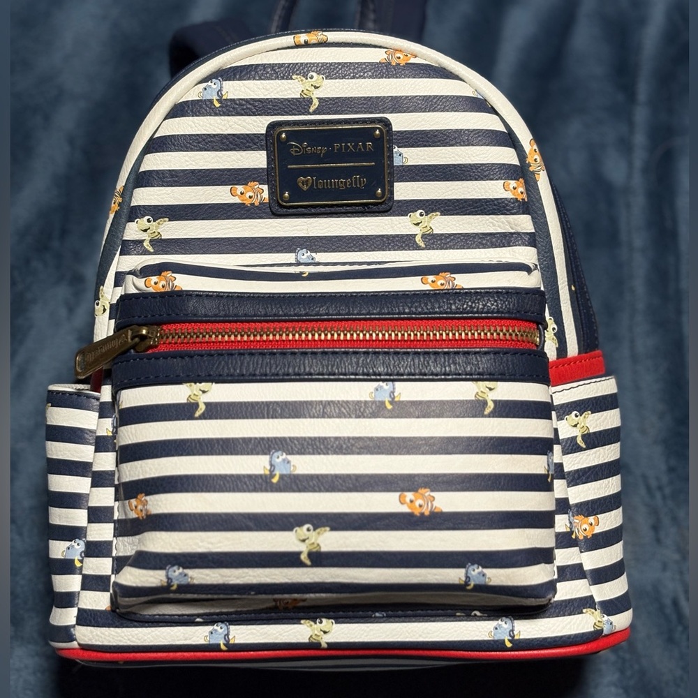DisneyxPixar Loungefly Navy and White Striped Backpack with Nemo and Friends